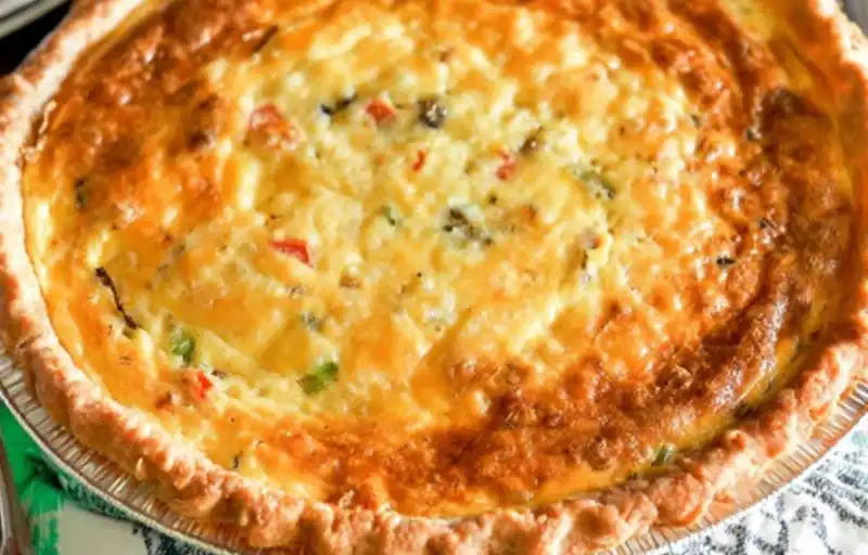 Western_Omelet_Quiche_1_result 2. Freshly baked Western Omelet Quiche garnished with herbs and green onions