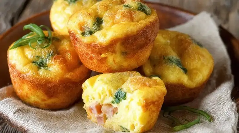 mini_egg_bites_Recipes_2_result Mini egg bites arranged in a muffin tin fresh out of the oven