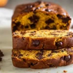 Freshly baked pumpkin bread with chocolate chips and warm spices
