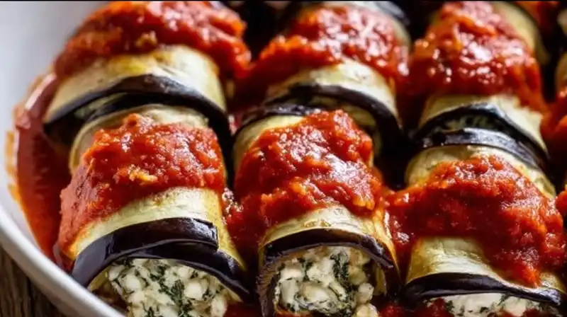 Eggplant_Rollatini_Recip_2_result Mixing ricotta, parmesan, basil, and garlic for eggplant rollatini filling