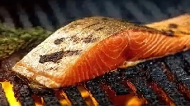 Grilled_Salmon_Preparati_0_result Fresh salmon fillets marinating in honey lemon soy sauce before grilling