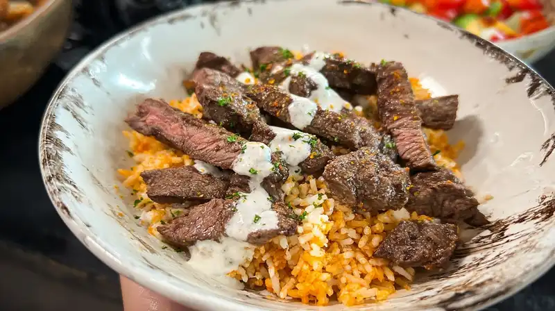 Steak_Queso_Rice_Recipe_1_result Basmati tomato rice topped with steak strips and creamy queso drizzle